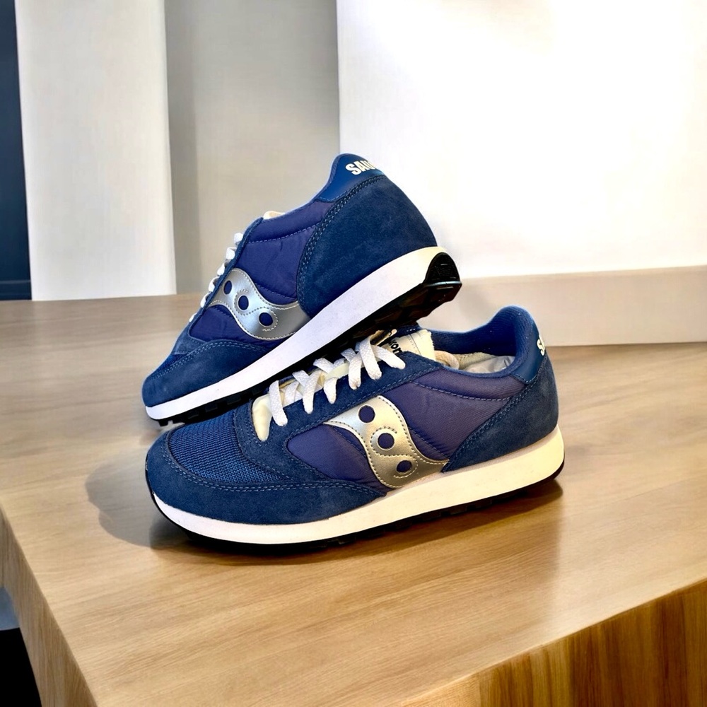 Men’s Saucany running shoes, size 10. 
In box, never worn.